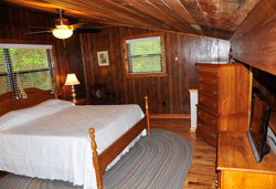 View of the King bed in the Loft at A Cabin on Paradise Murphy NC