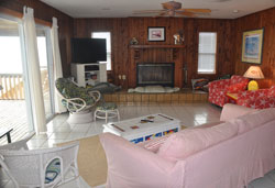 View of wood burning fire place in the living area of Twin Peaks on St. George Island FL