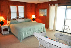View of King Master Bedroomin Twin Peaks on St. George Island FL